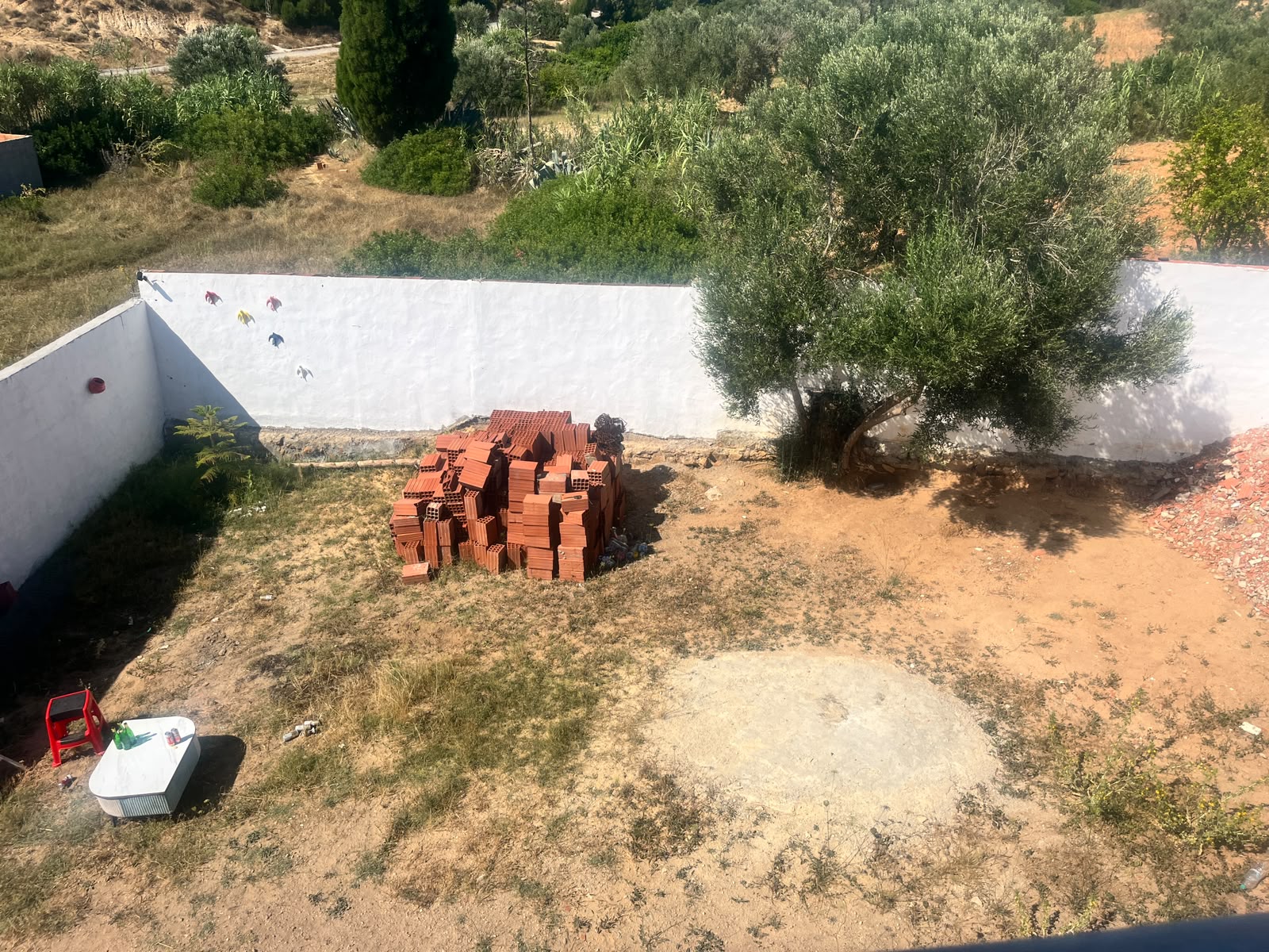 Maison avec jardin bâtie sur un terrain de 500 m
