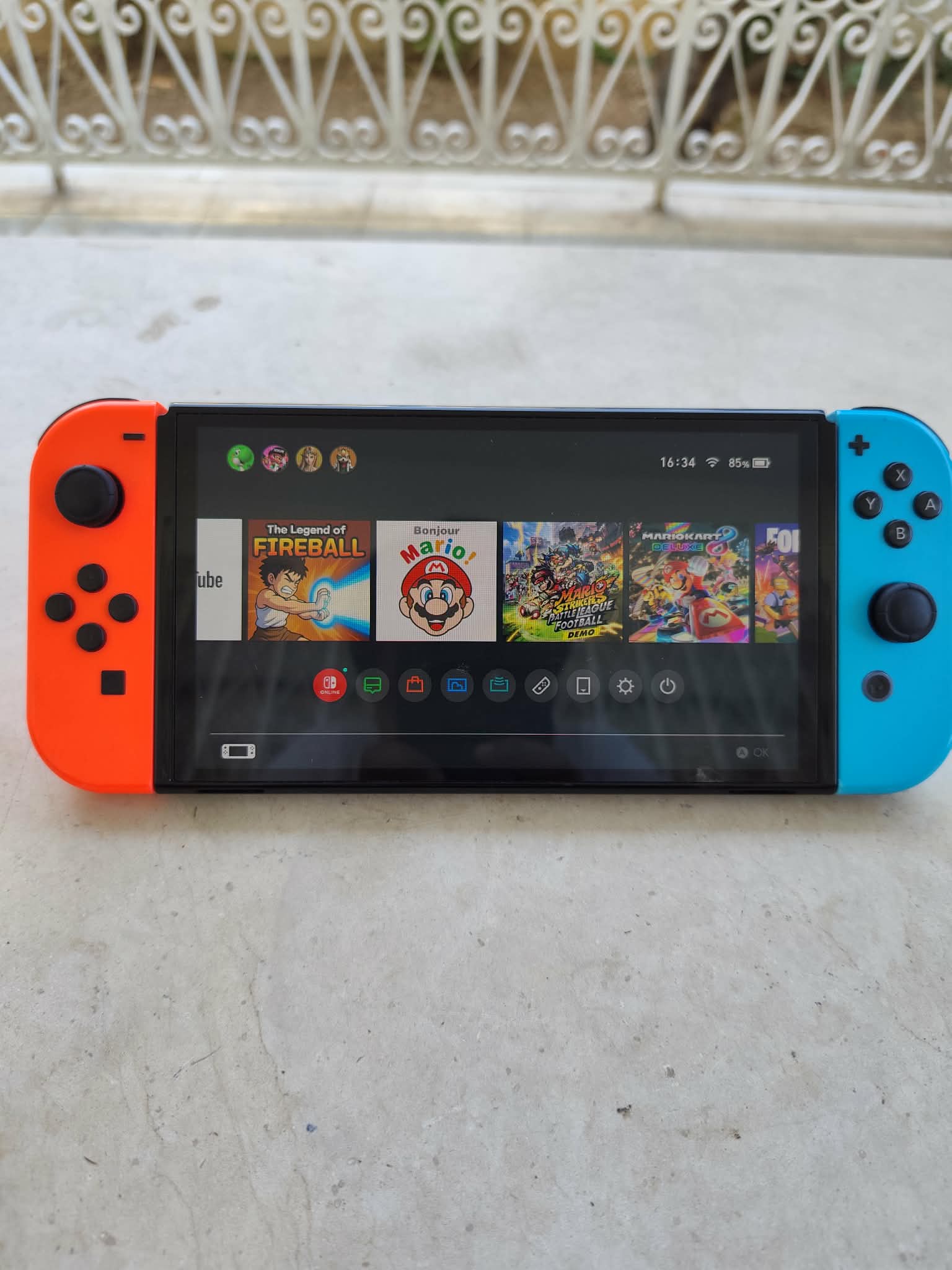 Nintendo switch oled avec accessoires et jeux