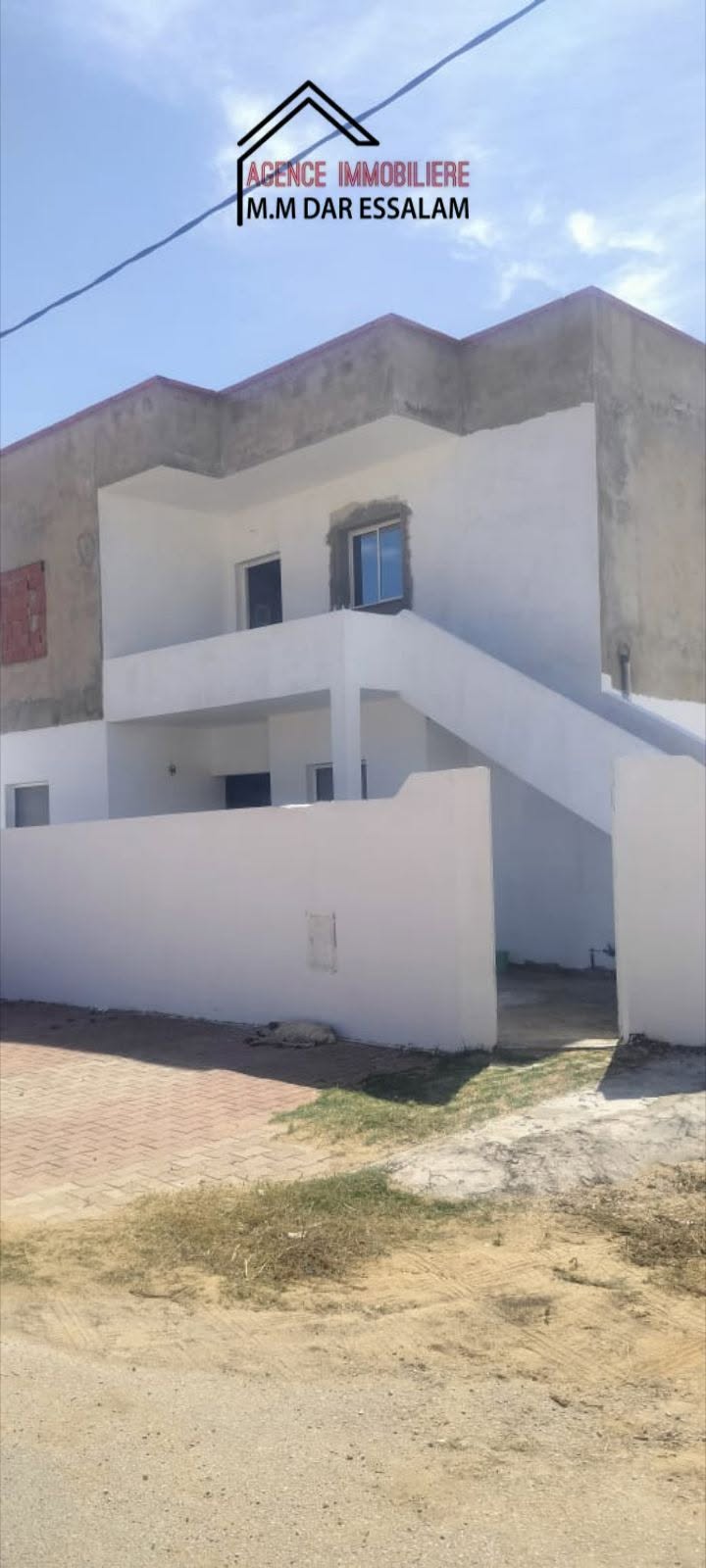 Maison avec deux étages près de la mer